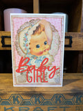 Vintage-style card with a baby girl illustration and 'Baby Girl' text on a pink background.